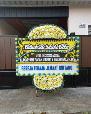 Papan Bunga Duka di Pamuruyan